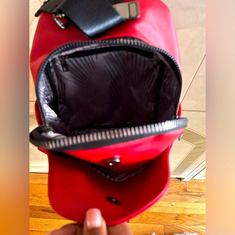 ARMISE GOLD elegant design red and black backpack.